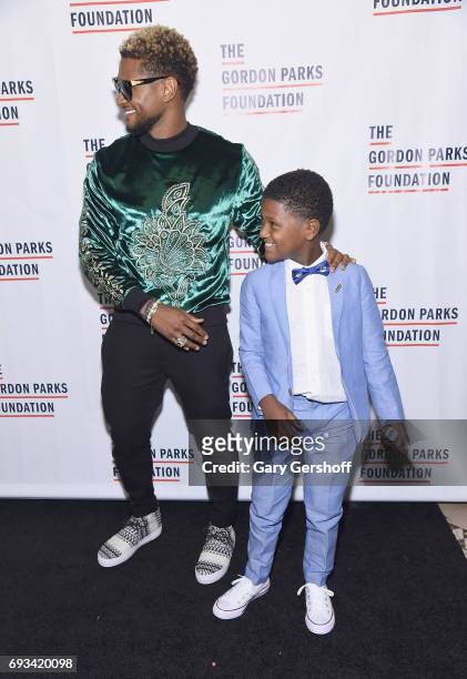 Singer Usher and son Naviyd Ely Raymond attend the 2017 Gordon Parks Foundation Awards gala at Cipriani 42nd Street on June 6, 2017 in New York City.