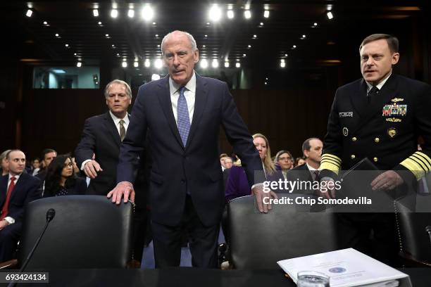 Director of National Intelligence Daniel Coats and National Security Agency Director Adm. Michael Rogers arrive to testify before the Senate...