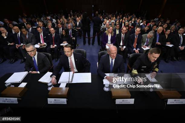 Acting FBI Director Andrew McCabe, Deputy Attorney General Rod Rosenstein, Director of National Intelligence Daniel Coats and National Security...