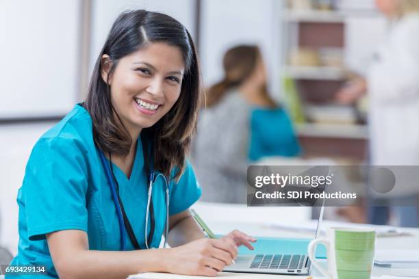Filipino Using Computer Photos and Premium High Res Pictures - Getty Images