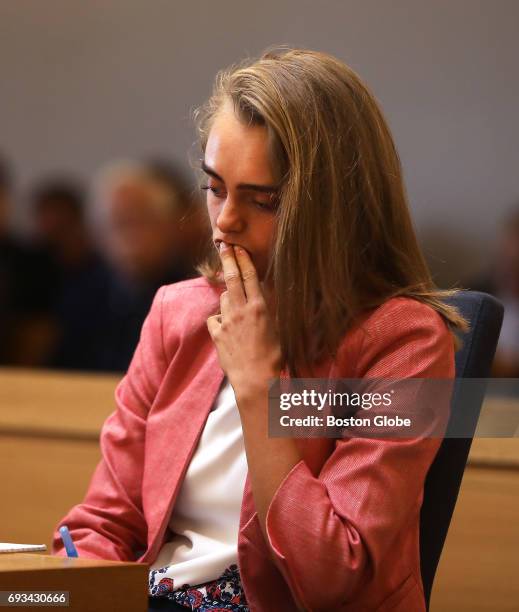 Michelle Carter listens as ADA Maryclare Flynn makes her opening statement, displaying many texts between Carter and Conrad Roy III as Carter's trial...