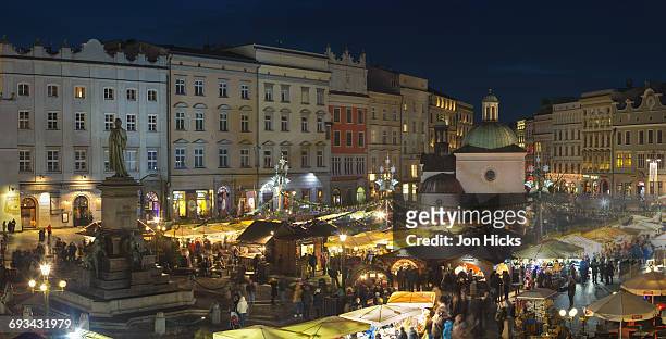 the christmas market in rynek g?ówny. - kraków stock pictures, royalty-free photos & images