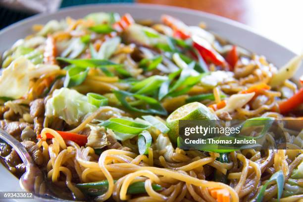pancit canton, a traditional filipino meal - filipino culture stock pictures, royalty-free photos & images