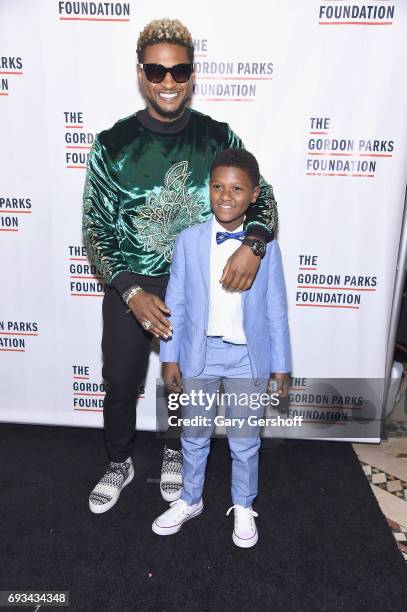 Singer Usher and son Naviyd Ely Raymond attend the 2017 Gordon Parks Foundation Awards gala at Cipriani 42nd Street on June 6, 2017 in New York City.