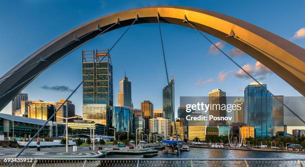 perth skyline from cable-stayed pedestrian bridge - perth australia stock pictures, royalty-free photos & images