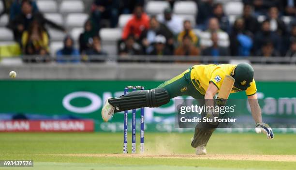 South Africa batsman David Miller is felled by a delivery and given out lbw which he manages to over turn during the ICC Champions Trophy match...