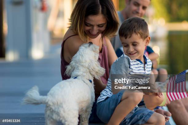 family spending day outdoors together - straw dogs stock pictures, royalty-free photos & images