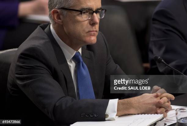 Acting FBI Director Andrew McCabe testifies during a Senate Select Intelligence Committee hearing on the Foreign Intelligence Surveillance Act on...