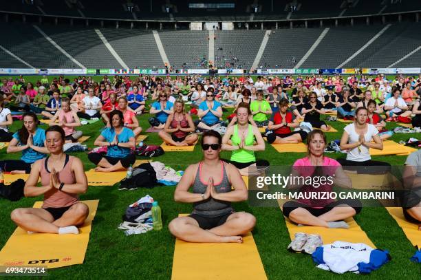 People take part in the Fitness-Dance-Yoga-Event during the 2017 Deutsches Turnfest at the Olympic Stadium in Berlin on June 7, 2017. / Germany OUT