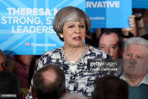 Prime Minister Theresa May speaks during her last campaign visit at the National Conference Centre on June 7, 2017 in Solihull, United Kingdom....