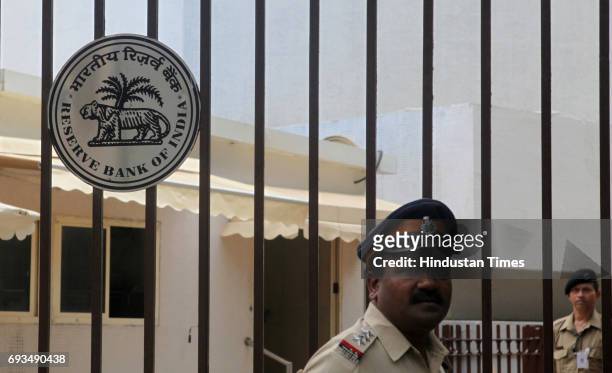 An Indian policeman stands guard outside the head office of the Reserve Bank of India in Mumbai -.