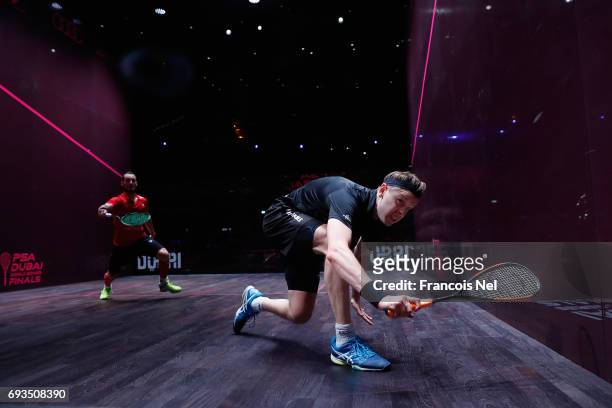 James Willstrop of England competes against Gregory Gaultier of France during day two of the PSA Dubai World Series Finals 2017 at Dubai Opera on...