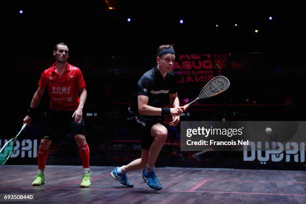 James Willstrop of England competes against Gregory Gaultier of France during day two of the PSA Dubai World Series Finals 2017 at Dubai Opera on...