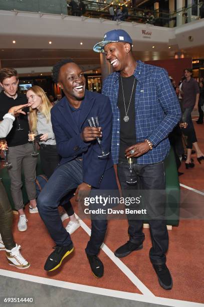 Arnold Oceng and Jamal Edwards attend the Lacoste VIP Exhibition Launch Westfield London at Westfield London on June 7, 2017 in London, England.