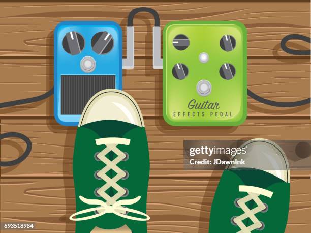 guitar pedals high angle view - guitar effects pedal stock illustrations