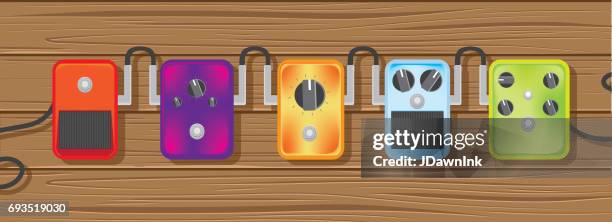 guitar pedals high angle view - guitar effects pedal stock illustrations