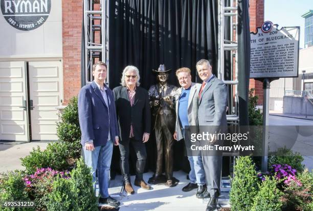 Sculptor Ben Watts,Ricky Skaggs,James Monroe and Billy Cody attend the unveiling of statues of Little Jimmy Dickens and Bill Monroe at Ryman...