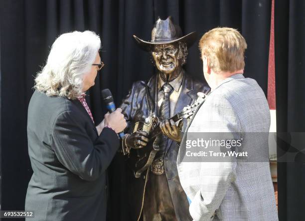 Ricky Skaggs and James Monroe attend the unveiling of statues of Little Jimmy Dickens and Bill Monroe at Ryman Auditorium on June 7, 2017 in...