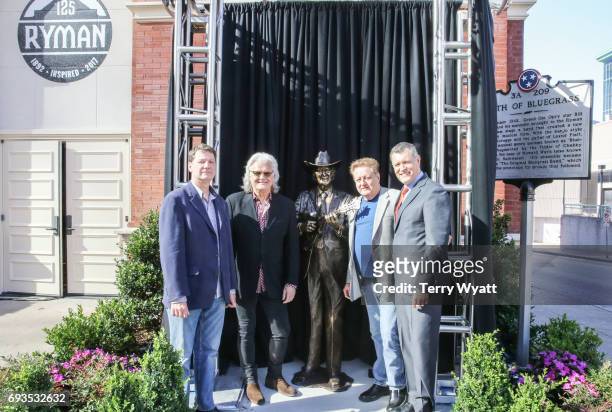 Sculptor Ben Watts, Ricky Skaggs, James Monroe and Billy Cody attend the unveiling of statues of Little Jimmy Dickens and Bill Monroe at Ryman...