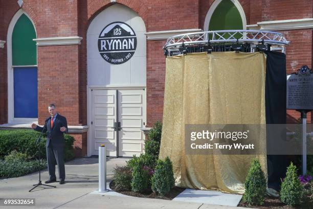 Bill Cody speaks during the unveiling of statues of Little Jimmy Dickens and Bill Monroe at Ryman Auditorium on June 7, 2017 in Nashville, Tennessee.