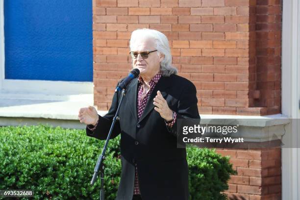 Ricky Skaggs speaks during the unveiling of statues of Little Jimmy Dickens and Bill Monroe at Ryman Auditorium on June 7, 2017 in Nashville,...
