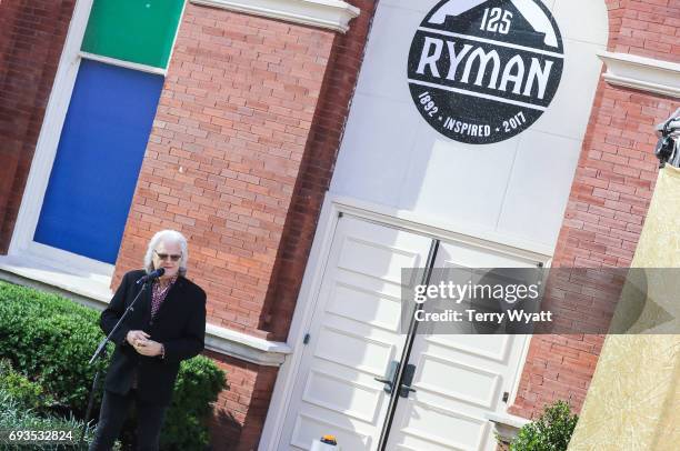 Ricky Skaggs speaks during the unveiling of statues of Little Jimmy Dickens and Bill Monroe at Ryman Auditorium on June 7, 2017 in Nashville,...