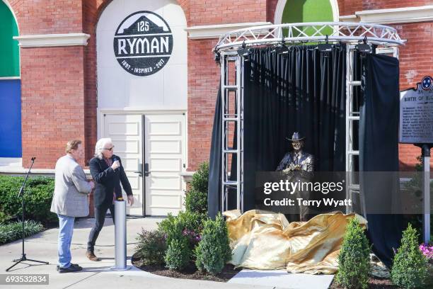 Ricky Skaggs and James Monroe attend the unveiling of statues of Little Jimmy Dickens and Bill Monroe at Ryman Auditorium on June 7, 2017 in...