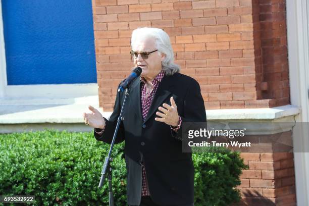 Ricky Skaggs speaks during the unveiling of statues of Little Jimmy Dickens and Bill Monroe at Ryman Auditorium on June 7, 2017 in Nashville,...