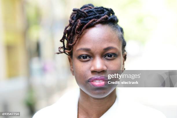 portrait of young woman - jamaicansk stock pictures, royalty-free photos & images