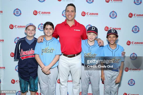 Mark Teixeira and Little League players at the Canon PIXMA Perfect Grand Slam event on June 7, 2017 in New York City.