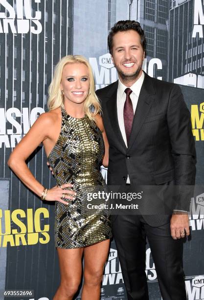 Caroline Boyer and singer-songwriter Luke Bryan attend the 2017 CMT Music Awards at the Music City Center on June 7, 2017 in Nashville, Tennessee.