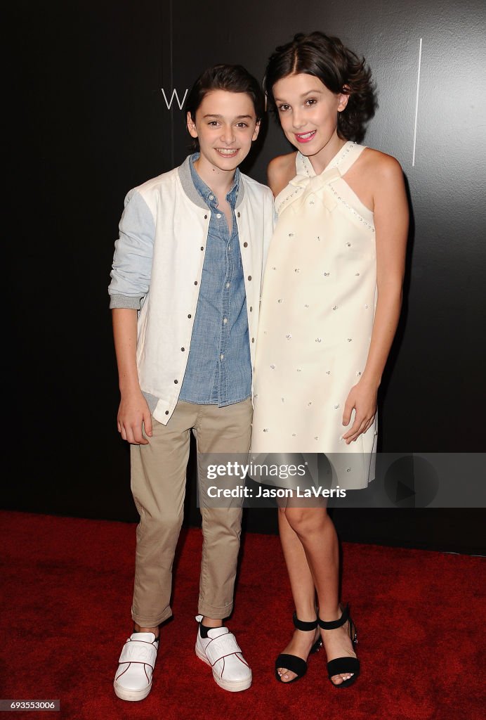 Actor Noah Schnapp and actress Millie Bobby Brown attend the... News