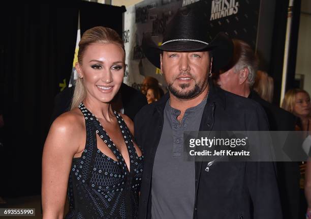 Brittany Kerr and singer-songwriter Jason Aldean attend the 2017 CMT Music Awards at the Music City Center on June 7, 2017 in Nashville, Tennessee.