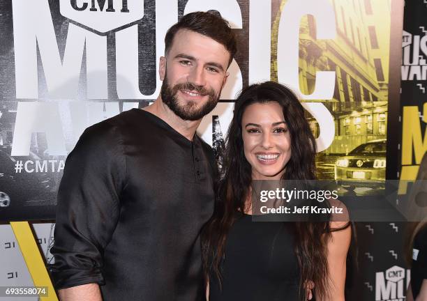 Singer-songwriter Sam Hunt and Hannah Lee Fowler attend the 2017 CMT Music Awards at the Music City Center on June 7, 2017 in Nashville, Tennessee.