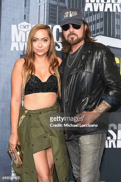 Actress Brandi Cyrus and musical artist Billy Ray Cyrus attend the 2017 CMT Music Awards at the Music City Center on June 7, 2017 in Nashville,...
