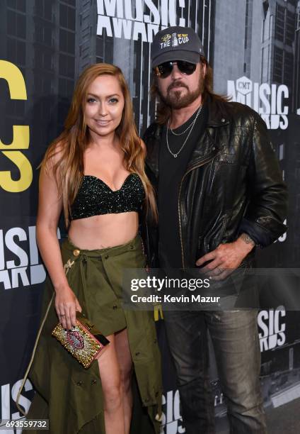 Brandi and Billy Ray Cyrus attend the 2017 CMT Music Awards at the Music City Center on June 7, 2017 in Nashville, Tennessee.