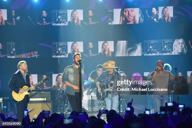 Derek Trucks, Charles Kelley of Lady Antebellum, Jason Aldean, and Darius Rucker perform onstage during the 2017 CMT Music Awards at the Music City...