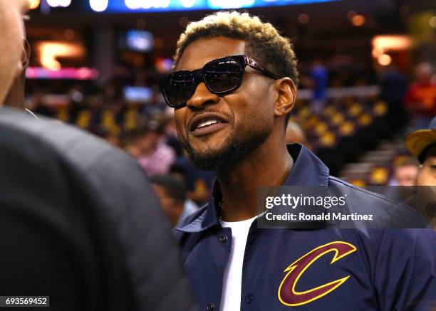 Recording artist Usher attends Game 3 of the 2017 NBA Finals between the Golden State Warriors and the Cleveland Cavaliers at Quicken Loans Arena on...