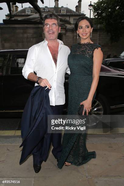 Simon Cowell and Lauren Silverman attend Together for Short Lives Midsummer Ball at Banqueting House on June 7, 2017 in London, England.