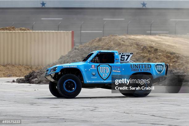 Texas Motor Speedway president, Eddie Gossage, participates during Speed Energy Super Trucks ride-alongs with former NASCAR/INDYCAR star Robby Gordon...