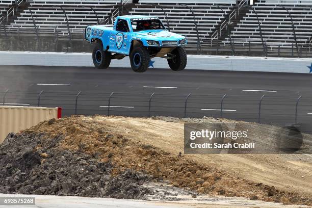 Members of the media participate during Speed Energy Super Trucks ride-alongs with former NASCAR/INDYCAR star Robby Gordon at Texas Motor Speedway on...