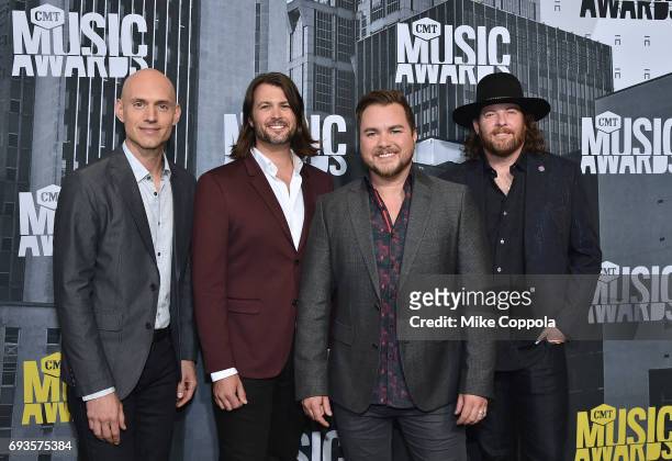 Jon Jones, Chris Thompson, Mike Eli, and James Young of The Eli Young Band attend the 2017 CMT Music Awards at the Music City Center on June 7, 2017...