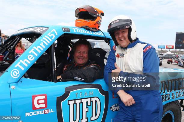 Members of the media participate during Speed Energy Super Trucks ride-alongs with former NASCAR/INDYCAR star Robby Gordon at Texas Motor Speedway on...