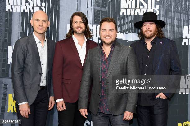 Musicians Jon Jones, Chris Thompson, Mike Eli, and James Young of Eli Young band attend the 2017 CMT Music Awards at the Music City Center on June 7,...