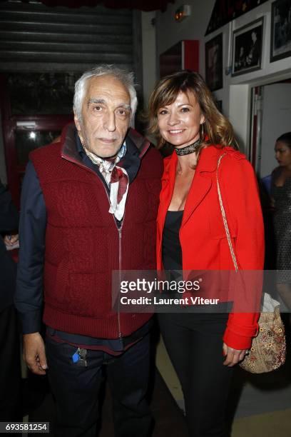 Gerard Darmon and Candice Berner attend Photographer Olivier Palade Exhibition at La Chope des Puces on June 7, 2017 in Saint-Ouen, France.