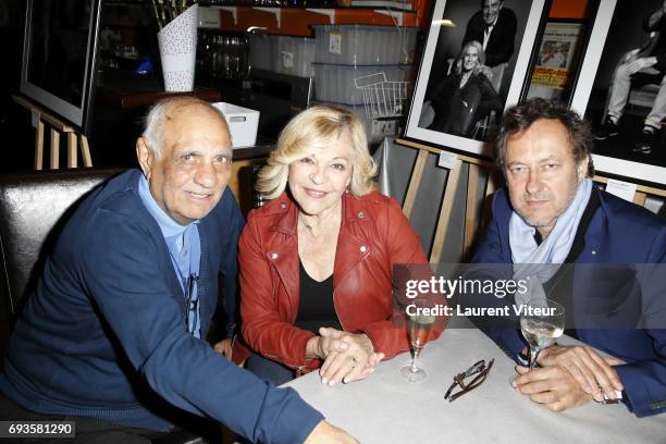 Joseph Bouglione, Nicoletta and Jean-Christophe Molinier attend Photographer Olivier Palade Exhibition at La Chope des Puces on June 7, 2017 in...