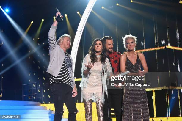 Phillip Sweet, Karen Fairchild, Jimi Westbrook, and Kimberly Schlapman accept an award onstage during the 2017 CMT Music Awards at the Music City...