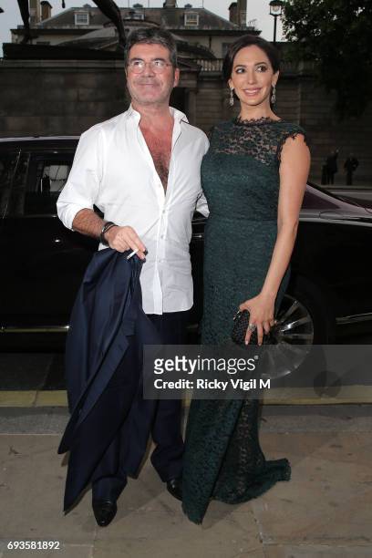 Simon Cowell and Lauren Silverman attend Together for Short Lives Midsummer Ball at Banqueting House on June 7, 2017 in London, England.
