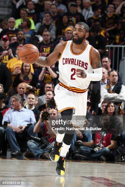 Kyrie Irving of the Cleveland Cavaliers handles the ball against the Golden State Warriors in Game Three of the 2017 NBA Finals on June 7, 2017 at...