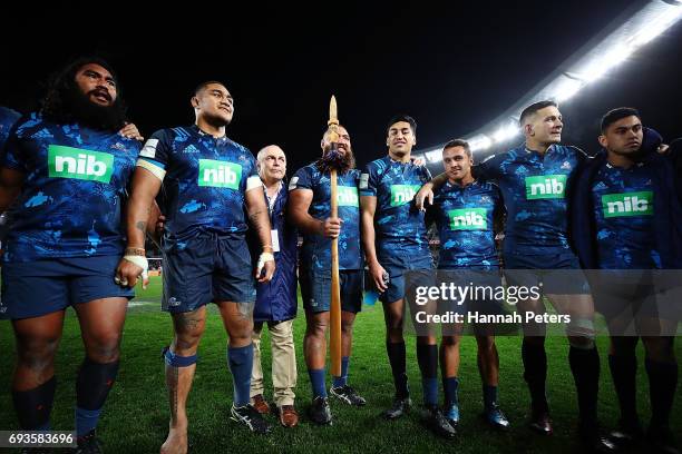 Hame Faiva, Ofa Tu'ungafasi, Charlie Faumuina, Rieko Ioane, Sam Nock, Sonny Bill Williams and Stephen Perofeta of the Blues celebrate after winning...